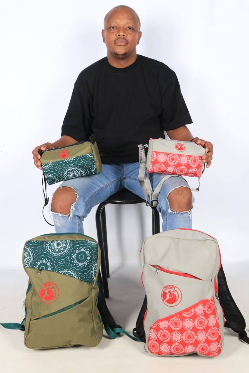 Pelican Bags CEO with product range