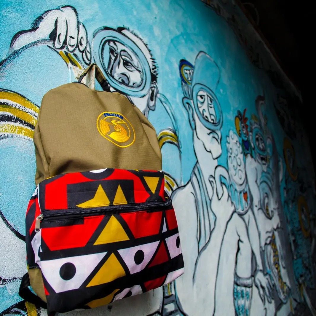 Pelican Bag with African patterns against street art in South Africa